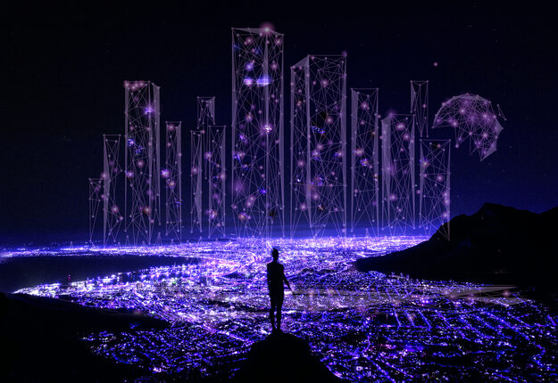 Glowing lights surrounded by darkness with person standing in the middle